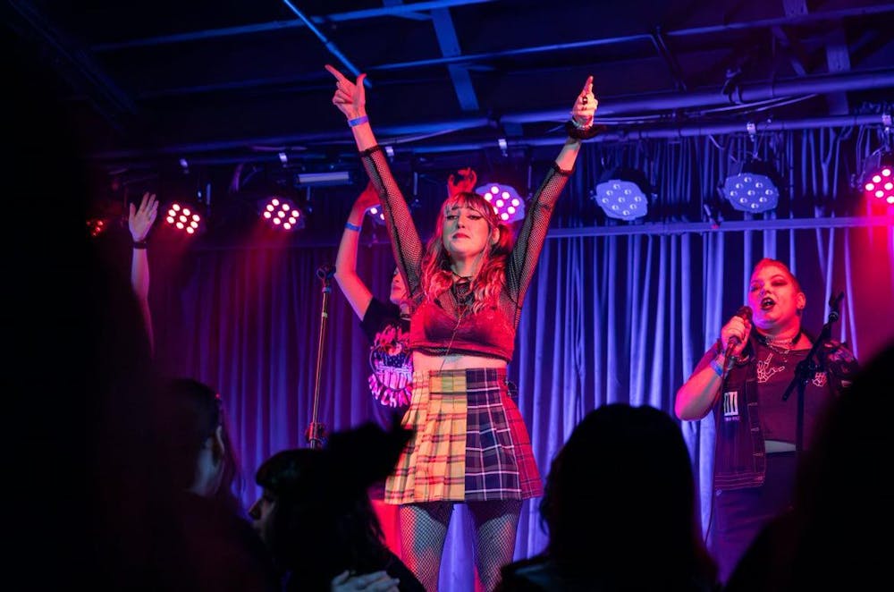 <p>Arden Riley, stage name Olive Arden, performs on stage during Emo Night at New Brookland Tavern on April 27, 2024. The former WUSC DJ has been performing at New Brookland Tavern for the past two years.</p>