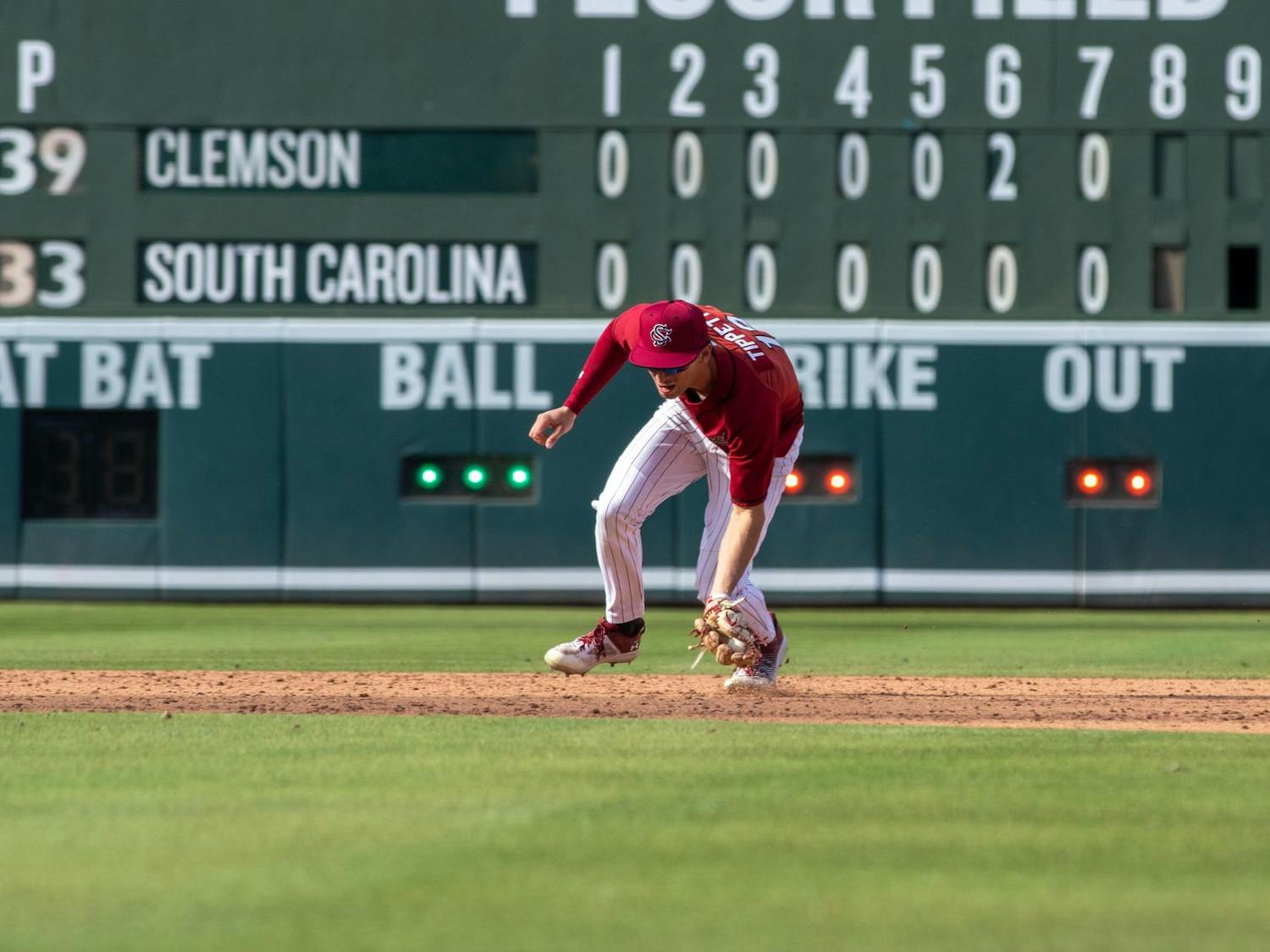 Junior infielder Will Tippett hustles to field the ball against Clemson at Fluor Field on March 1, 2025. South Carolina fell to the Tigers 5-1, in the neutral site matchup. 