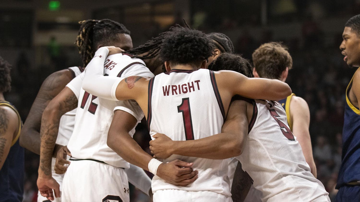 FILE - The Gamecock men's basketball team huddles after drawing a foul during the team’s game against Notre Dame on Nov. 28, 2023. The Gamecocks finished the 2023-24 season 28-6.