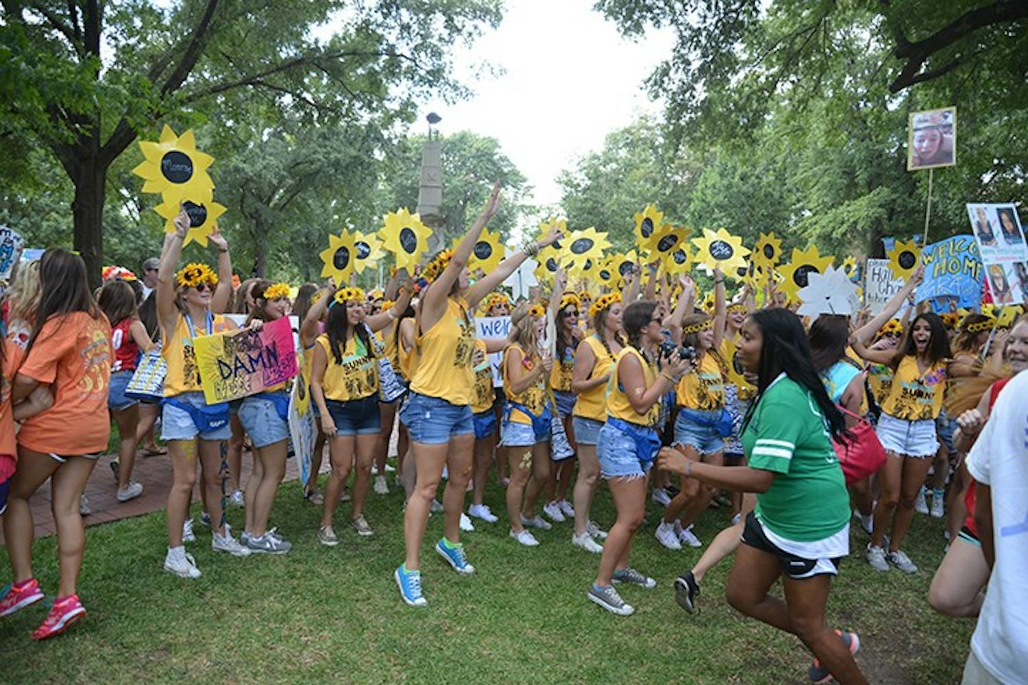 After two weeks of recruitment, hundreds of women received their bids and dashed to their newfound sisterhoods Sunday during the annual Bid Day festivities.