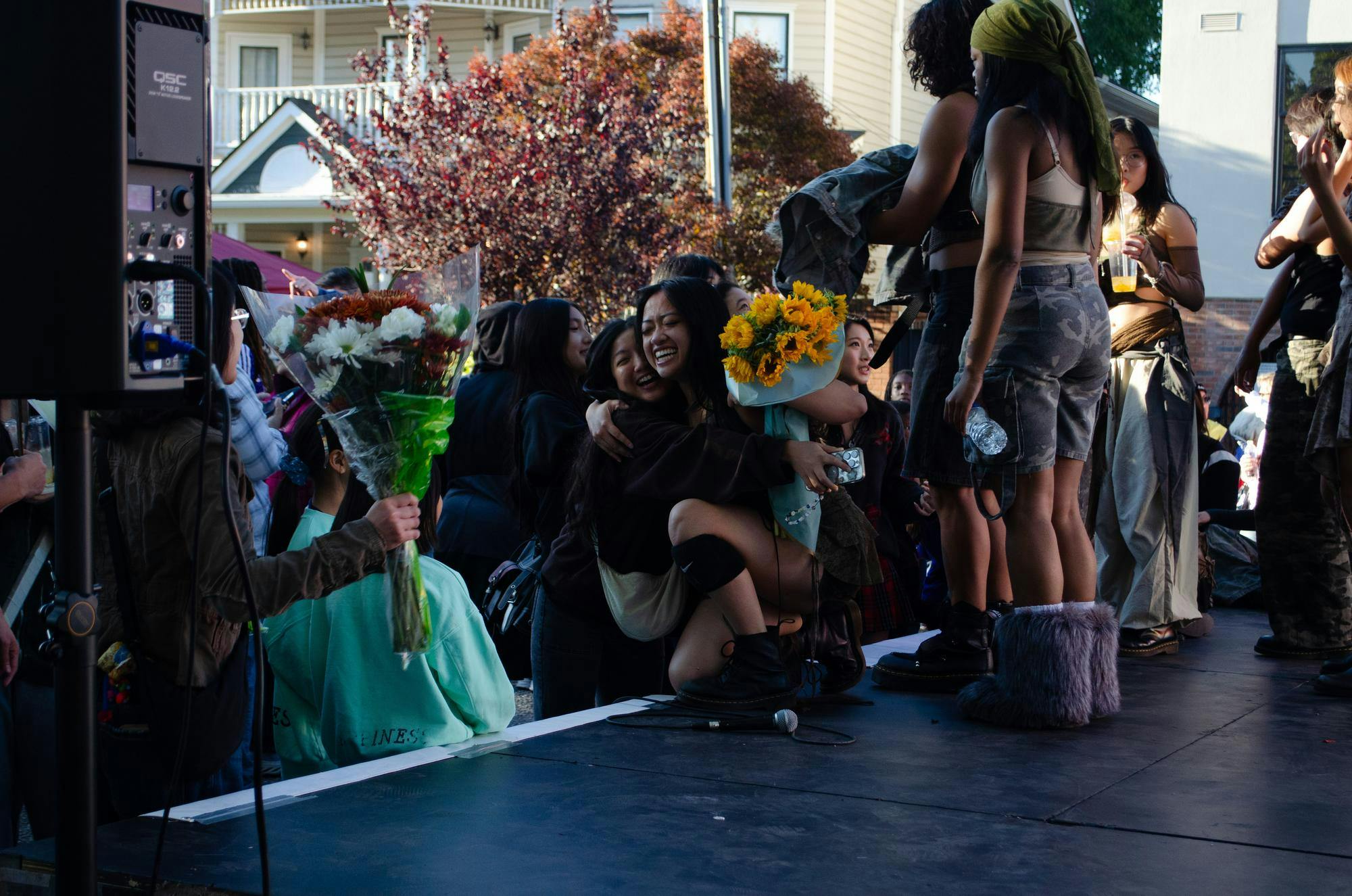 A Member of the 803 Crew receives flowers for her group’s win in the K-Pop dance contest at the SC Korean Festival at 1412 Richland St. on Nov. 1, 2025. Their win this year is the second in a row in the competition.