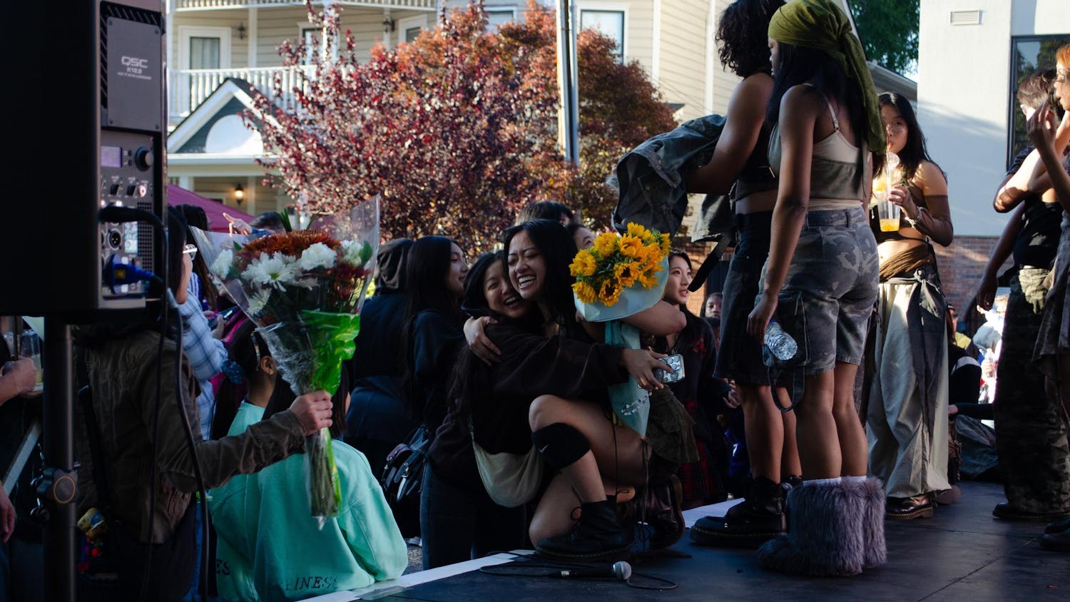 A Member of the 803 Crew receives flowers for her group’s win in the K-Pop dance contest at the SC Korean Festival at 1412 Richland St. on Nov. 1, 2025. Their win this year is the second in a row in the competition.