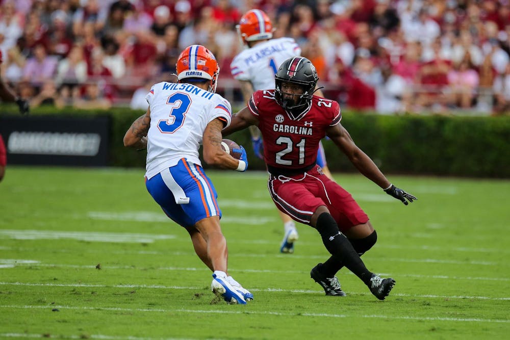 <p>FILE — Junior defensive back Nick Emmanwori defends an opposing player, who is carrying the ball up the field during South Carolina’s game against Florida on Oct. 14, 2023, at Williams-Brice Stadium. South Carolina defeated the Kentucky Wildcats on Sept. 8, 2024. </p>