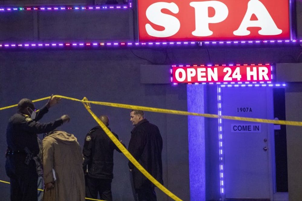 Police officers and detectives respond to a crime scene at Aromatherapy Spa and Gold Spa in Atlanta on Tuesday, March 16, 2021.