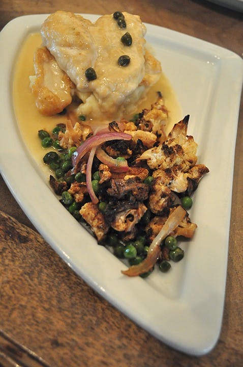 	Chicken piccata with roasted cauliflower, English peas, and red onions