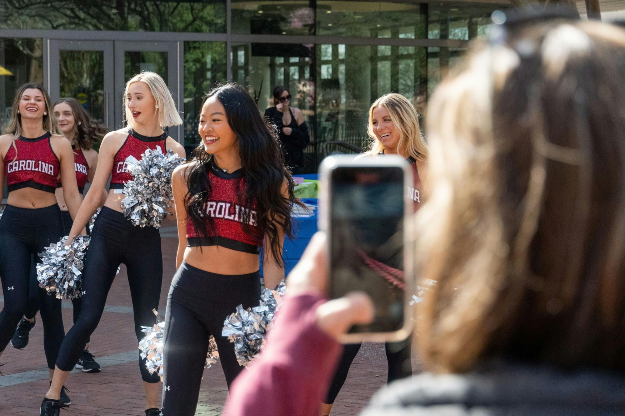 The Carolina Coquettes undergo a dance routine amongst the crowd in preparation of the NEDA Walk on Feb. 26, 2022.The NEDA Walk took place as a charity event raise support and money for those who effected by eating disorders.