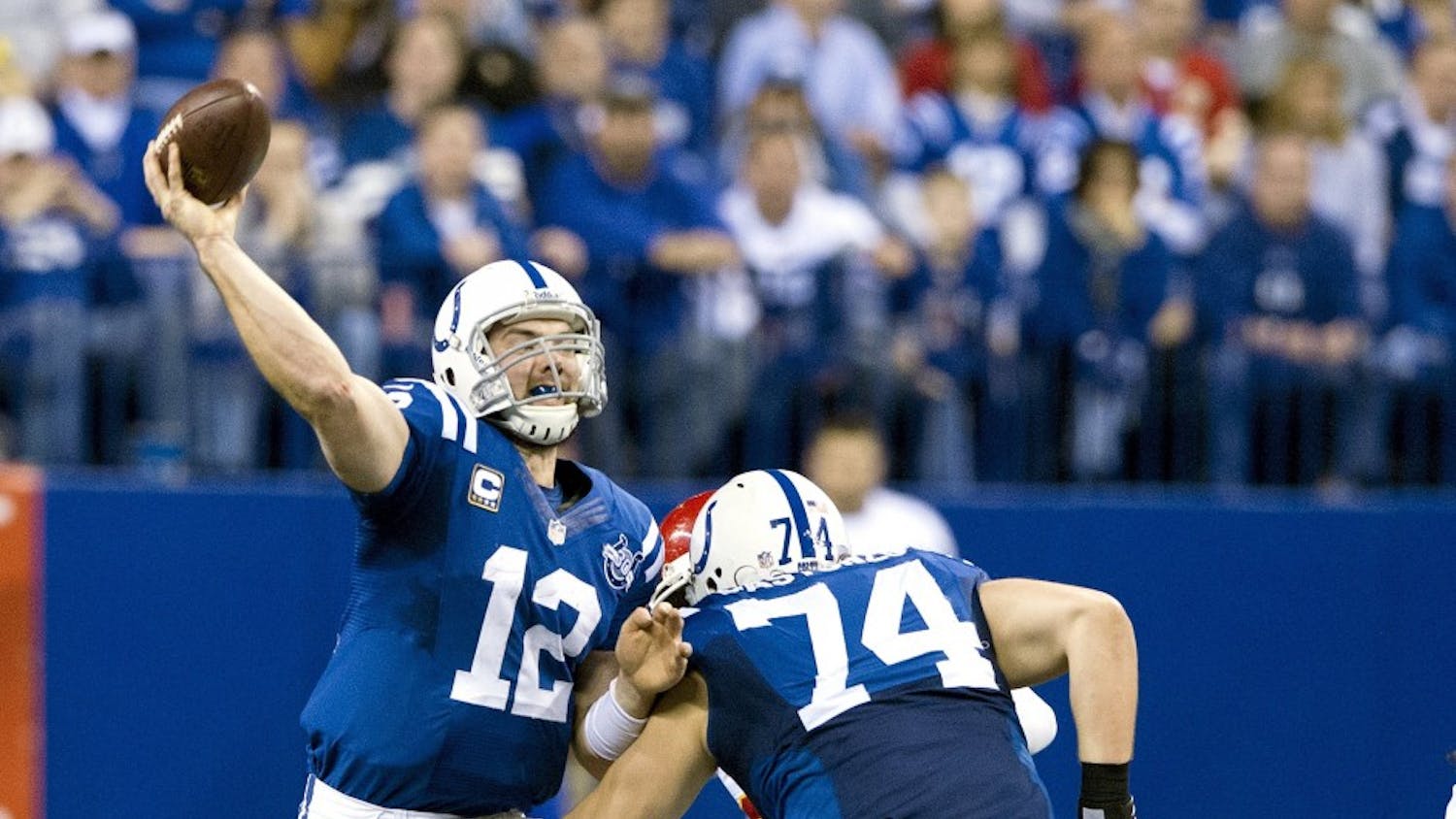Indianapolis Colts quarterback Andrew Luck (12) launches a 65-yard touchdown pass to wide receiver T.Y. Hilton against the Kansas City Chiefs in the fourth quarter of an AFC Wild Card Game at the Lucas Oil Stadium in Indianapolis, Ind., Saturday, Jan. 4, 2014. The Colts beat the Chiefs, 45-44. (John Sleezer/Kansas City Star/MCT)