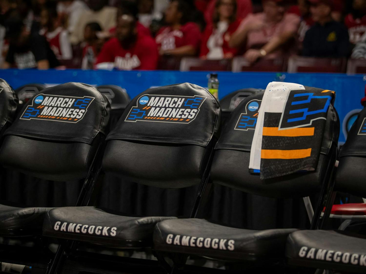 Chairs covered in March Madness slips are prepared for the teams to sit on when the University of South Carolina and Indiana University face off in the second round of the NCAA March Madness Tournament on March 23, 2025. The two teams went back and forth as there were four lead changes throughout the game.