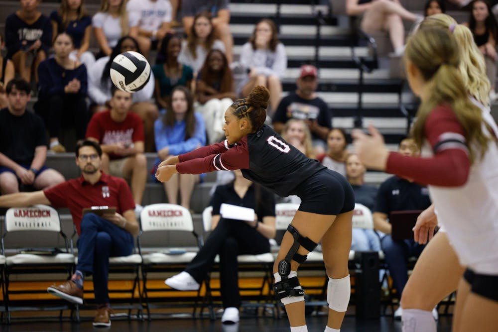 <p>Freshman libero Victoria Harris nails a dig in the first set agains ECU. Harris had 14 total digs across three sets.</p>