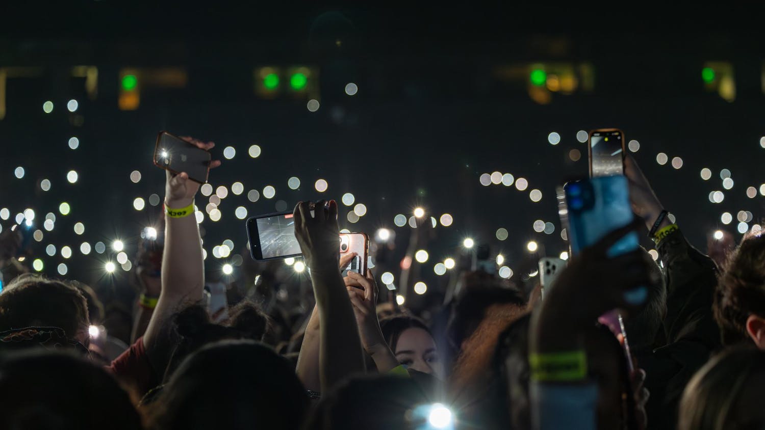 FILE — University of South Carolina students hold up their phone flashlights while Quavo performs at the annual Cockstock concert on Jan. 29, 2025.