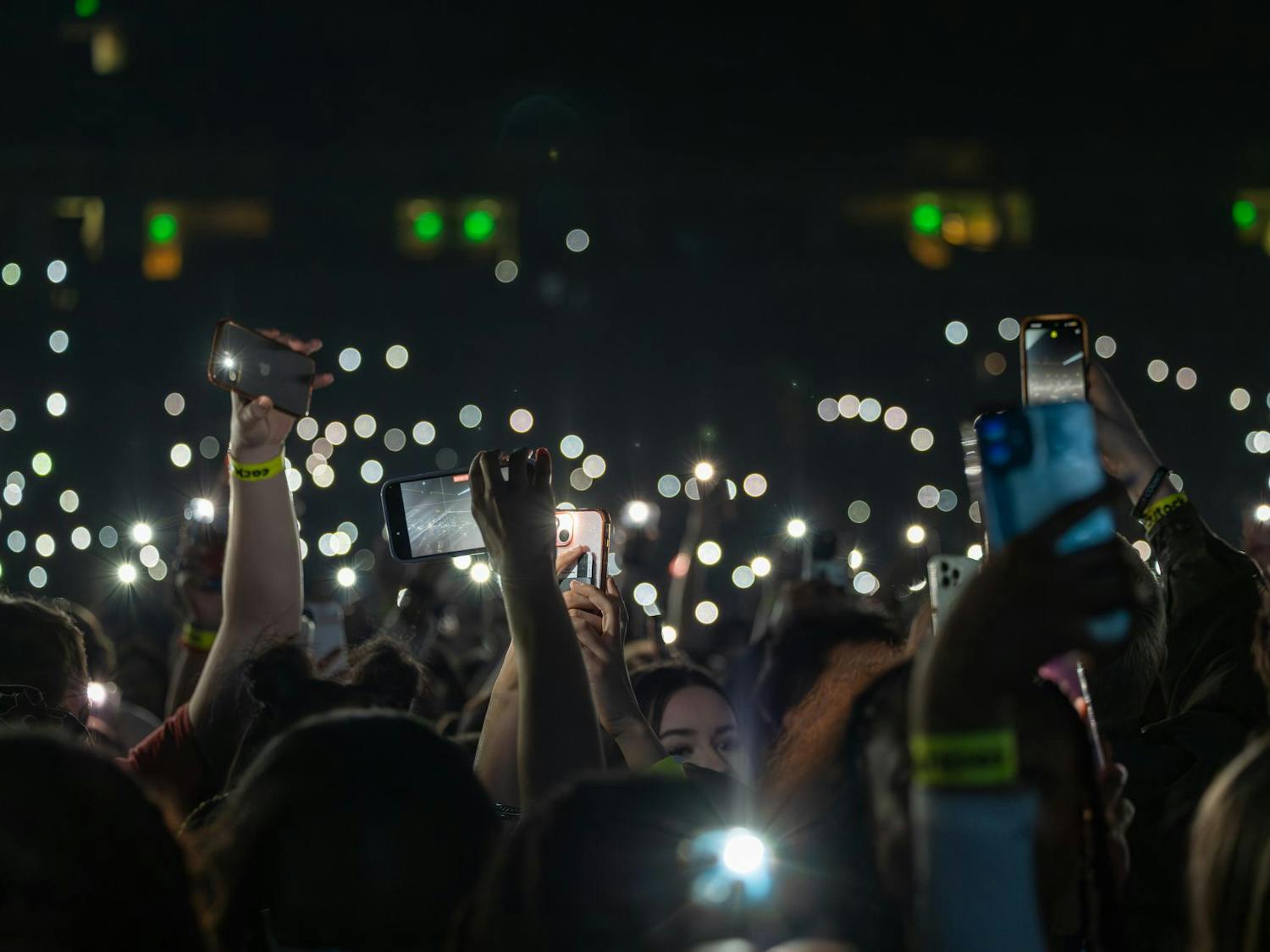 FILE — University of South Carolina students hold up their phone flashlights while Quavo performs at the annual Cockstock concert on Jan. 29, 2025.