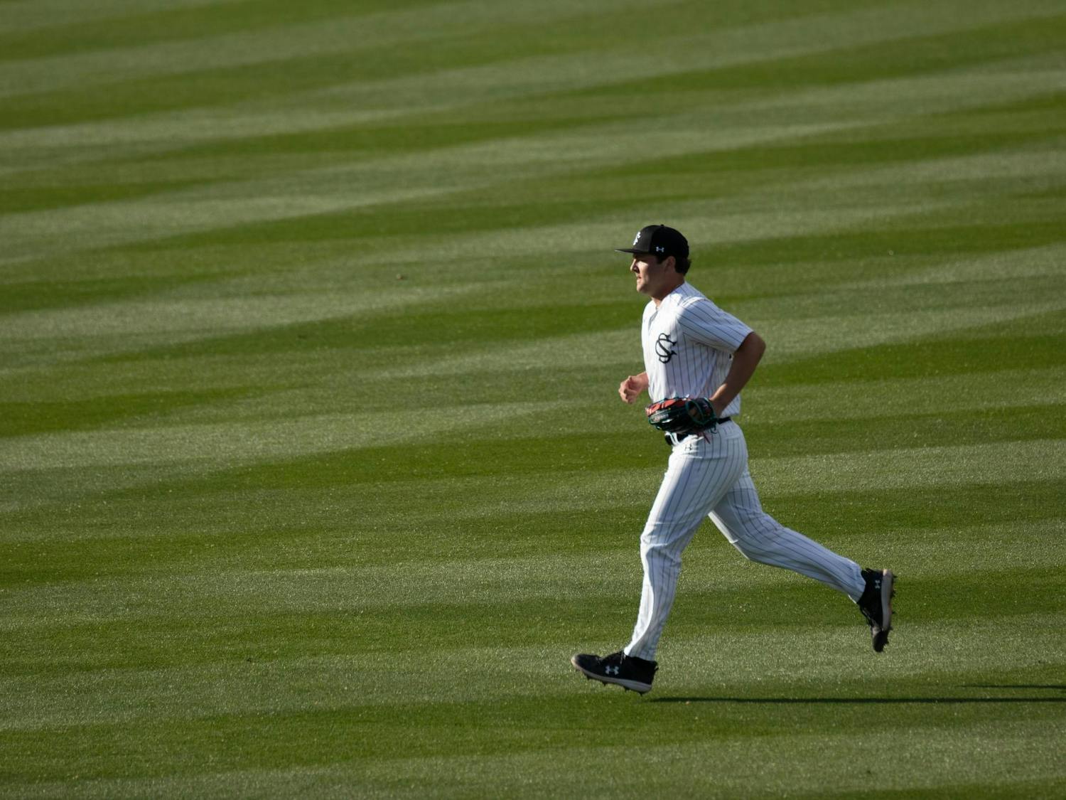 Sophomore pitcher Austin Williamson runs toward the mound after being called in from the bullpen during South Carolina's game against Belmont on Feb. 24, 2024. Williamson allowed three hits and three runs scored during the Gamecocks' 11-2 loss to the Bruins.