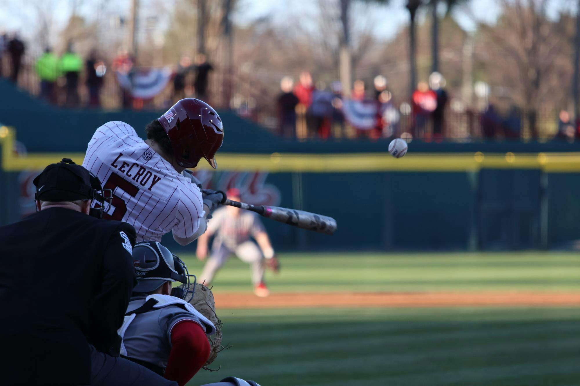 Senior catcher Talmadge LeCroy hits the ball to center field during the game against Sacred Heart on Feb. 14, 2025. The Gamecocks won their home opener 5-3.
