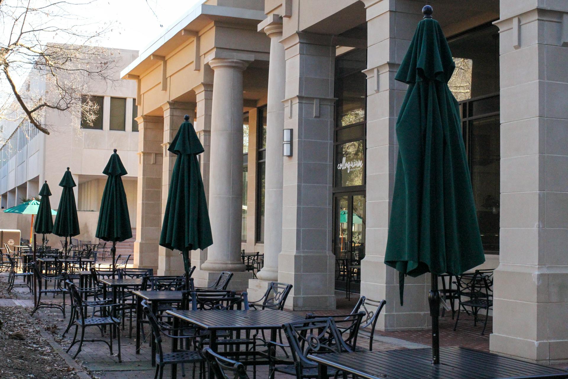 Tables line the sidewalk outside the Colloquium Café at the University of South Carolina on Feb. 4, 2023. The café’s outdoor seating is one of many popular study locations on campus.