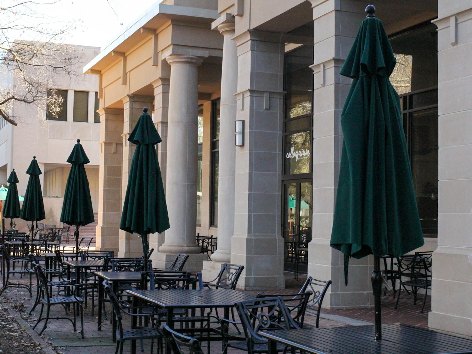 Tables line the sidewalk outside the Colloquium Café at the University of South Carolina on Feb. 4, 2023. The café’s outdoor seating is one of many popular study locations on campus.