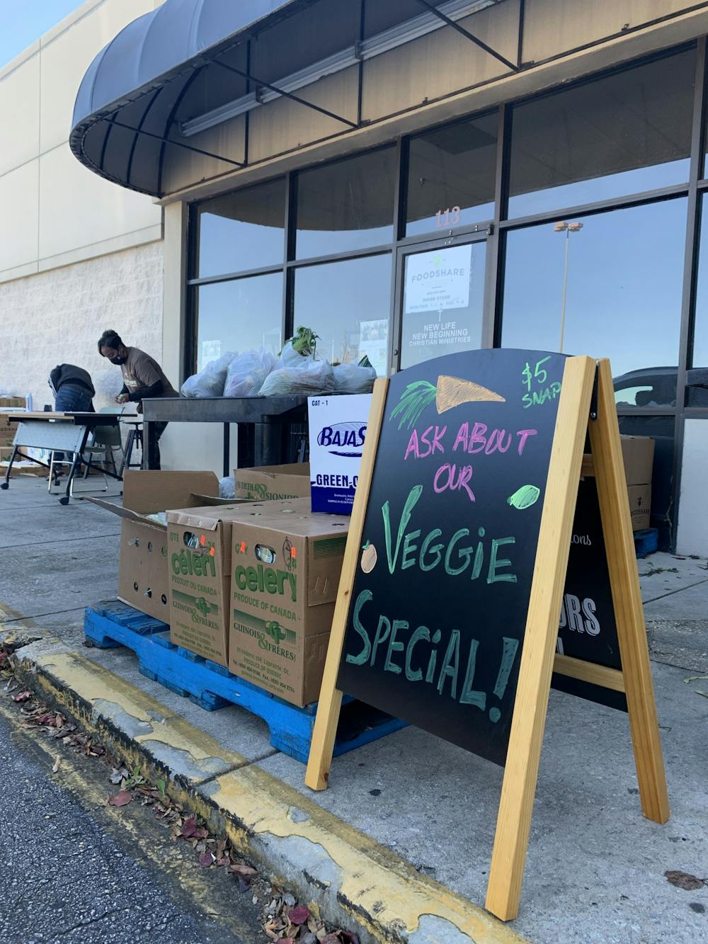 <p>A sign outside of New Life New Beginnings Christian Ministries marks the veggie sale.&nbsp;</p>
