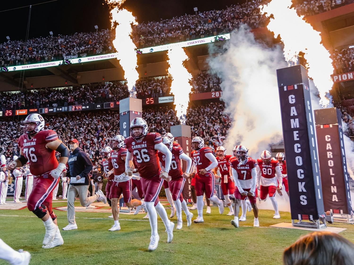 The South Carolina Gamecocks and Head Football Coach Shane Beamer enter the field as they get ready to play against the Clemson Tigers for the Palmetto Bowl on Nov. 27, 2021.&nbsp;