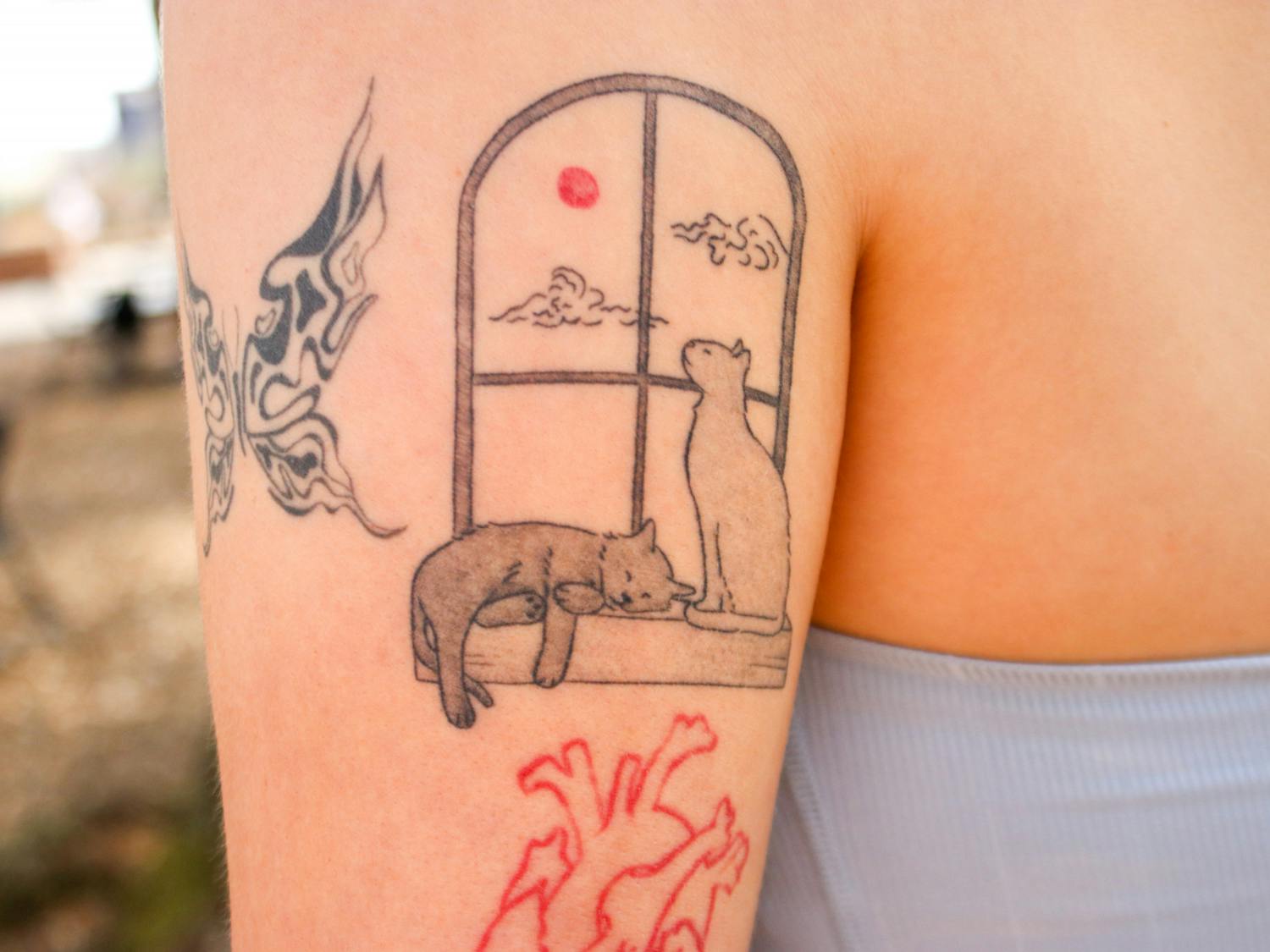 Sandford’s most recent tattoo is of her two cats, Max and Ruby. For her, this tattoo was an easy decision to make and an even easier one to fall in love with. “I just love it. It’s such a peaceful, simple part of joy that I get to have on me,” Sandford said.