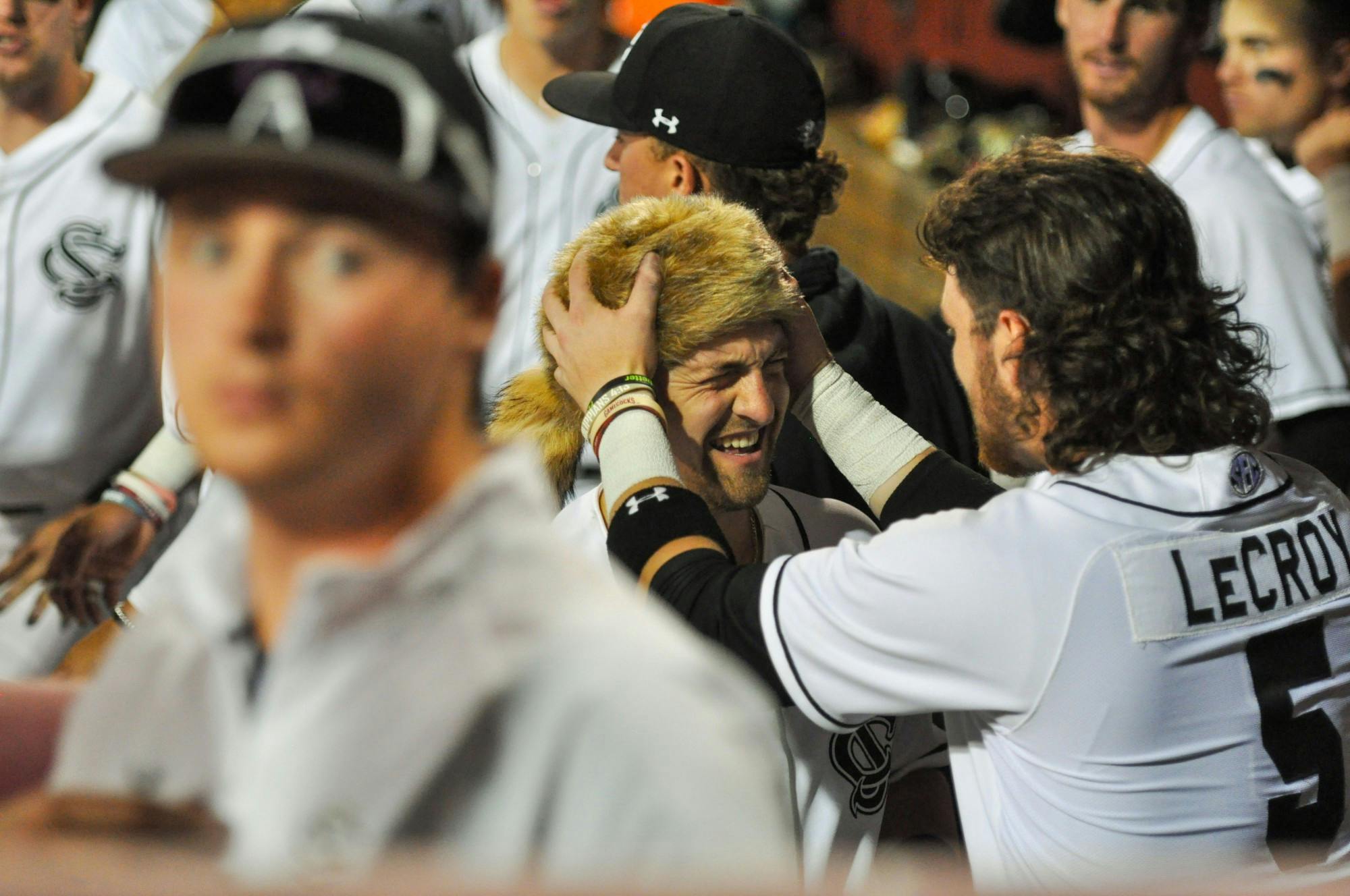 The South Carolina baseball team celebrates following a win against North Florida Tuesday evening, April 13, 2022. South Carolina defeated the Ospreys 4-2 in a midweek matchup.