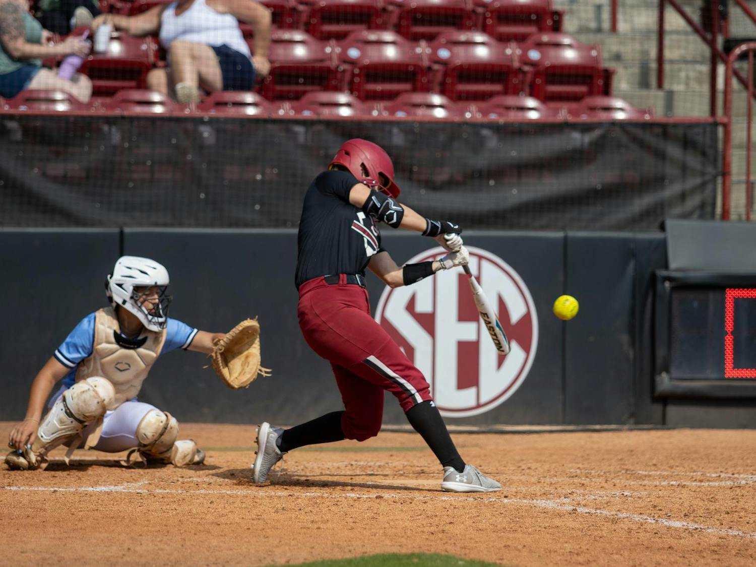 Sophomore second baseman Karley Shelton hits the ball to deep left field in the exhibition game against The University of South Carolina Beaufort on Sept. 28, 2024, at Beckham Field. Shelton played 50 games last season, starting in 34 of them. 