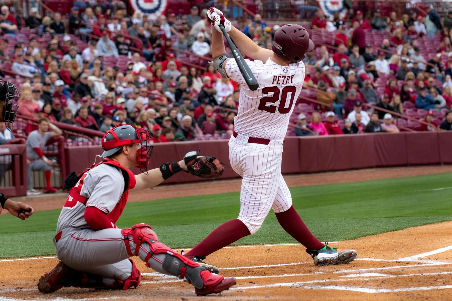 Sophomore outfielder Ethan Petry hits the ball at Founders Park on Feb 16, 2024. Petry helped the Gamecocks win its first game of season opener against Miami-Ohio and hit two home runs during the three-game series.