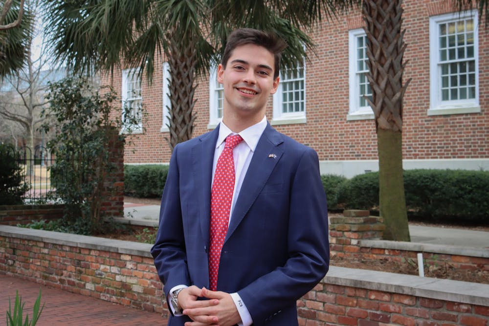 <p>Student Body President candidate Patton Byars stands outside of USC's School of Journalism and Mass Communications for a posed photo on Feb. 9, 2024. Byars is running on a ballot with current student body member Courtney Tkacs for president and vice president, respectively.</p>