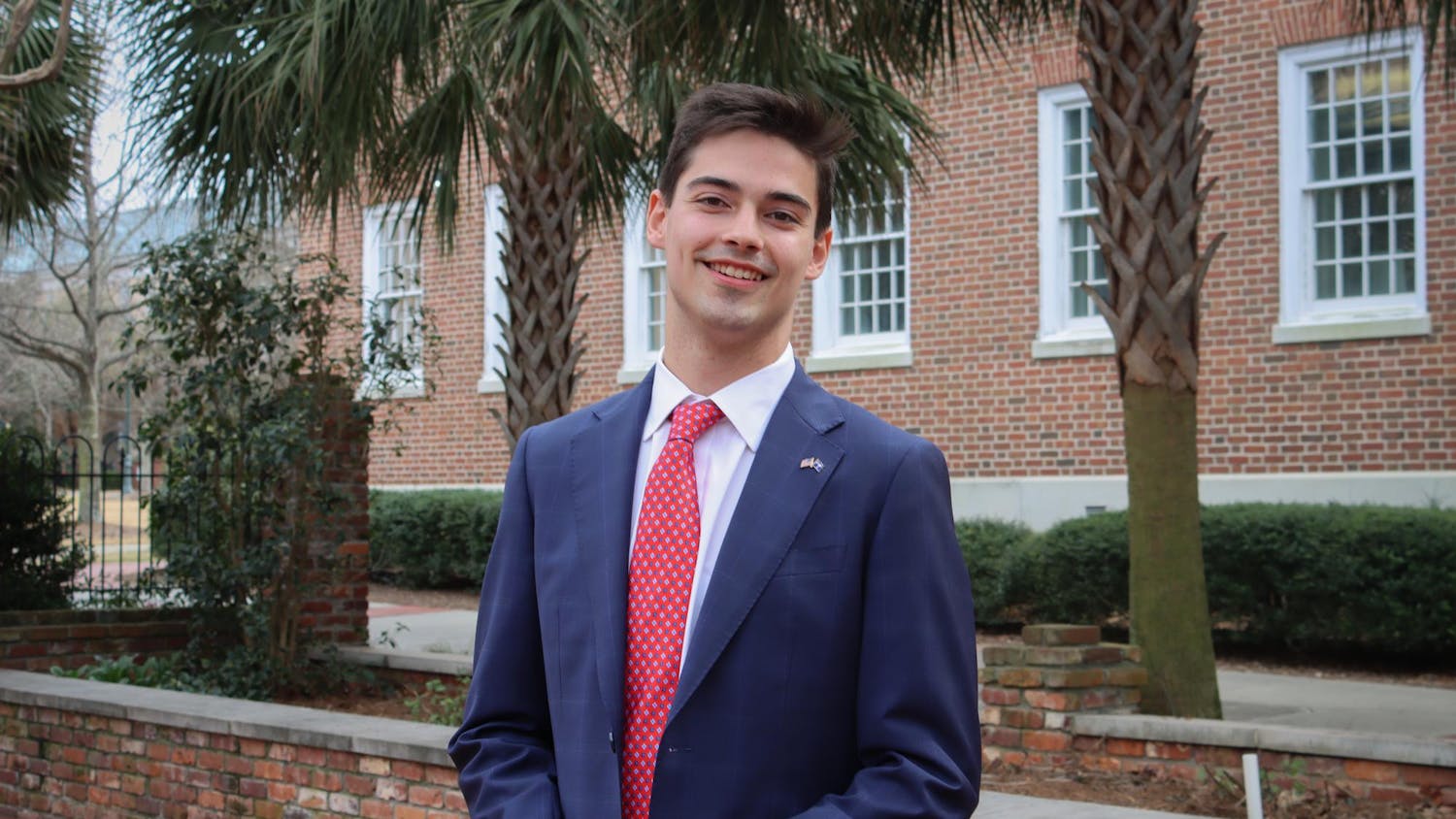 Student Body President candidate Patton Byars stands outside of USC's School of Journalism and Mass Communications for a posed photo on Feb. 9, 2024. Byars is running on a ballot with current student body member Courtney Tkacs for president and vice president, respectively.