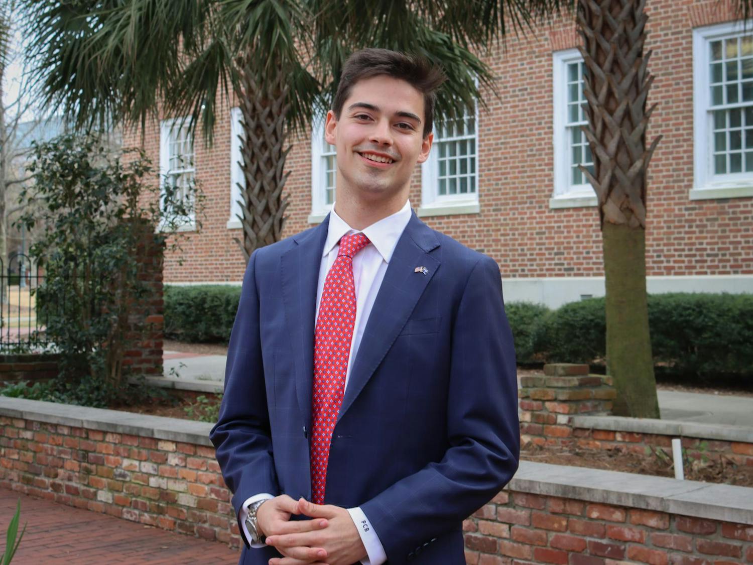 Student Body President candidate Patton Byars stands outside of USC's School of Journalism and Mass Communications for a posed photo on Feb. 9, 2024. Byars is running on a ballot with current student body member Courtney Tkacs for president and vice president, respectively.