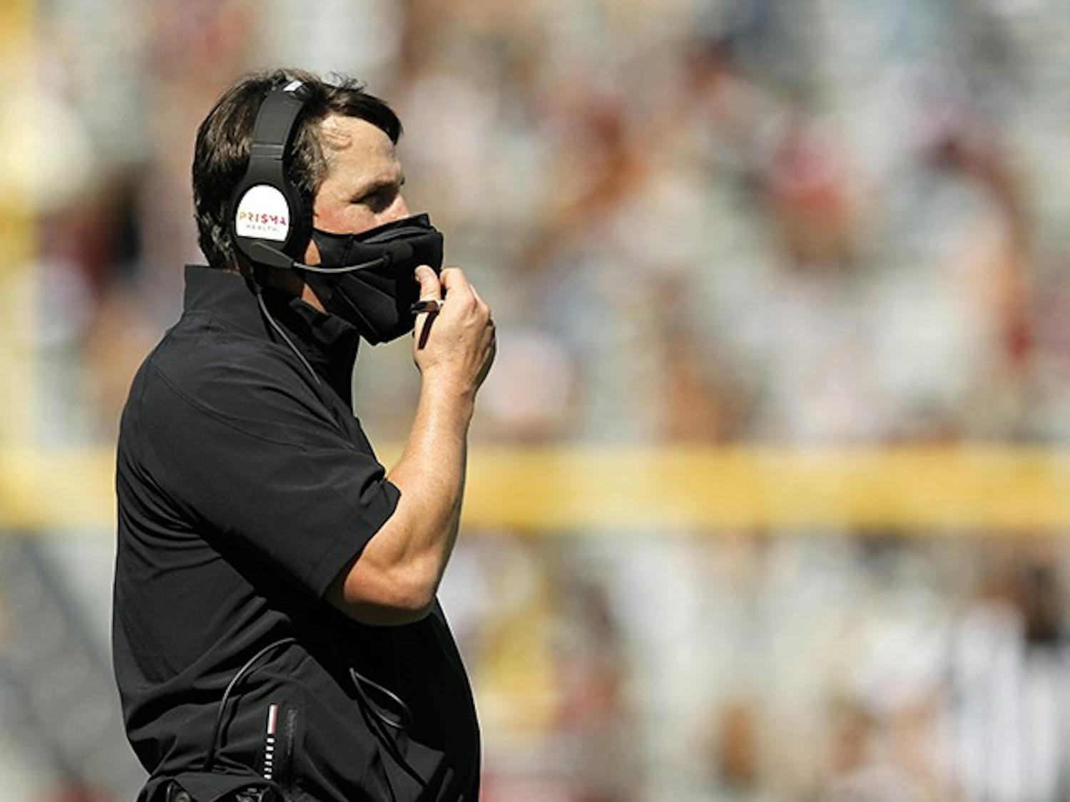 South Carolina head football coach Will Muschamp fixes his mask during the game against Auburn on Saturday, Oct. 17. The Gamecocks will travel to Baton Rouge on Saturday, Oct. 24 to take on the LSU Tigers.