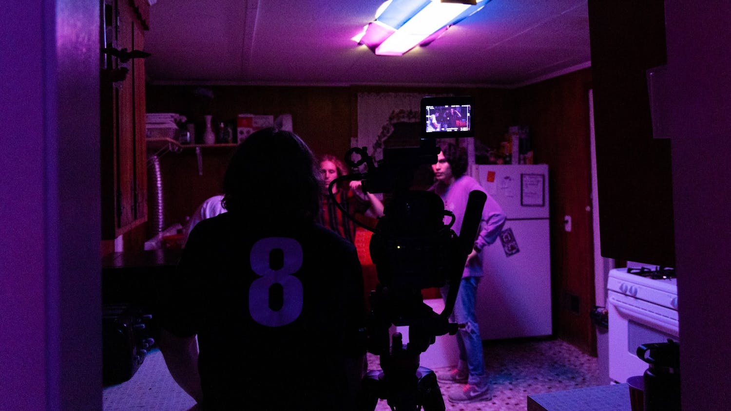 USC alumnus John Slice gives instructions from behind the camera during a party scene on June 16, 2022. Slice and his friends finished filming their first feature film, "To What End," on June 24.&nbsp;