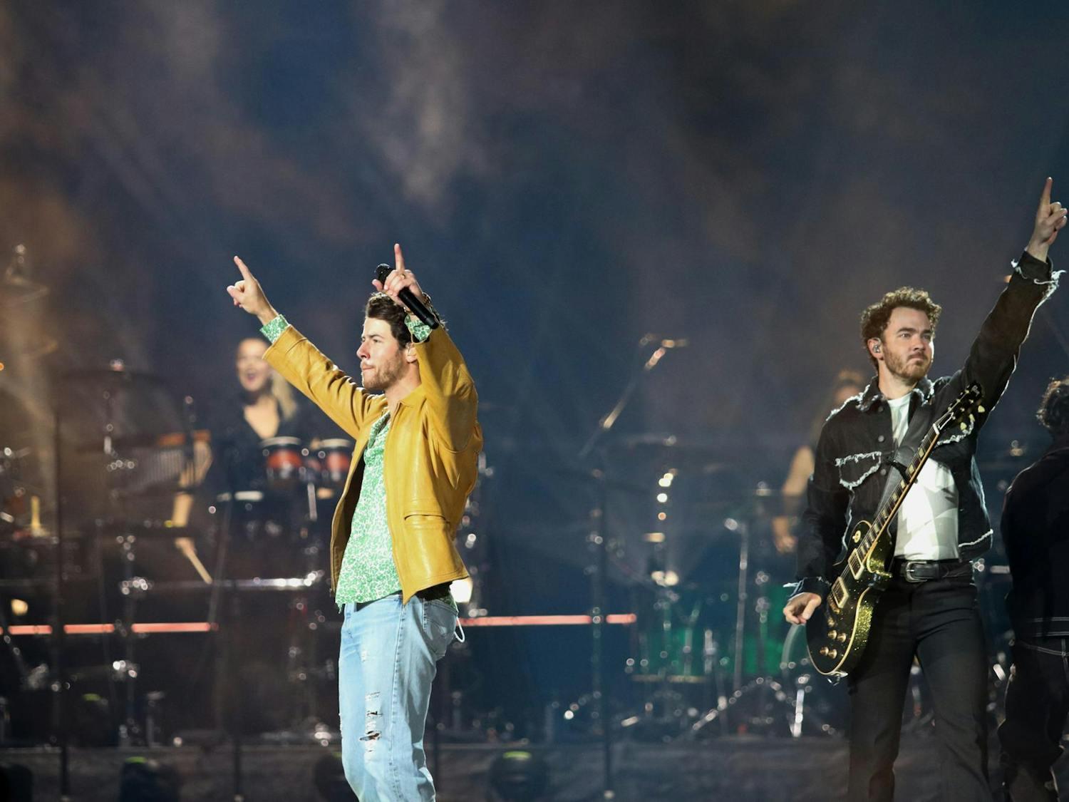 Nick and Kevin Jonas acknowledge the crowd at the start of their set at Colonial Life Arena. The Jonas Brothers performed on The Tour in Columbia, S.C., on Oct. 10, 2023.