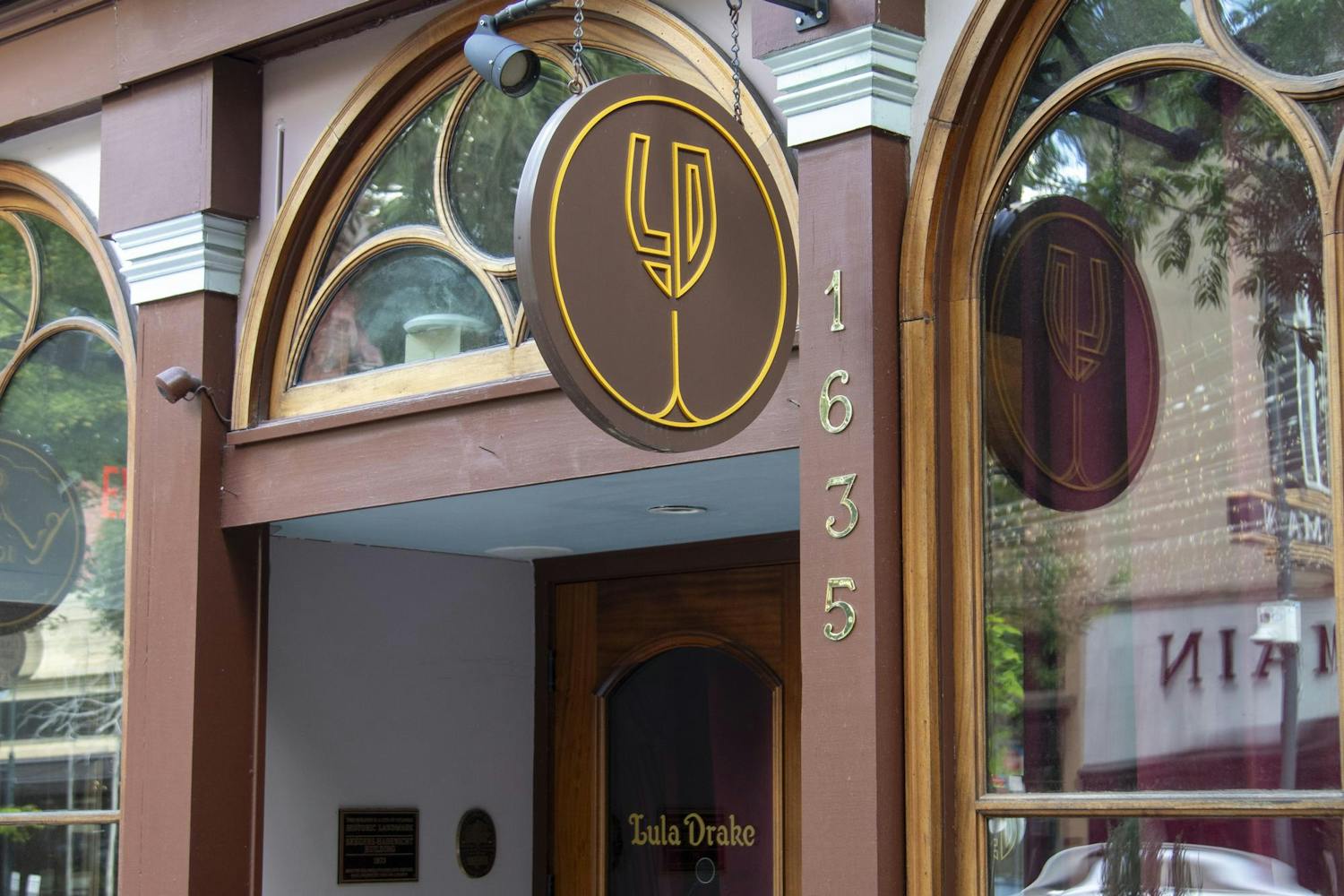 The Lula Drake Wine Parlour sign hangs on Main Street on June 29, 2024. Lula Drake Wine Parlour won a James Beard Award, which recognizes exceptional talent and achievement in hospitality.
