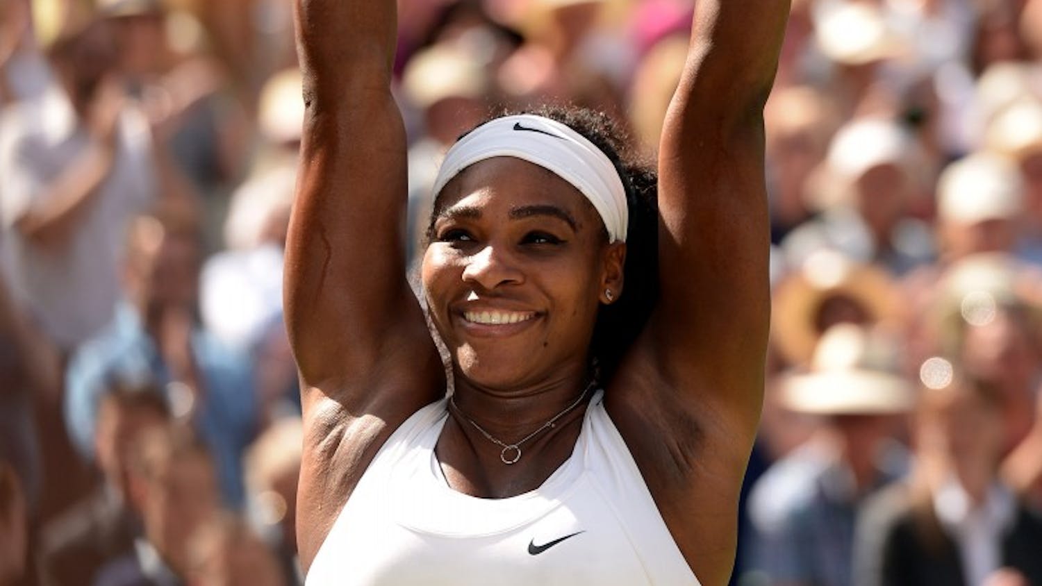 Serena Williams celebrates her sixth Wimbledon title and fourth consecutive win in a Grand Slam event after a 6-4, 6-4 win against Garbine Muguruza in the women's final at Wimbledon in London on Saturday, July 11, 2015. (Adam Davy/PA Wire/Zuma Press/TNS)
