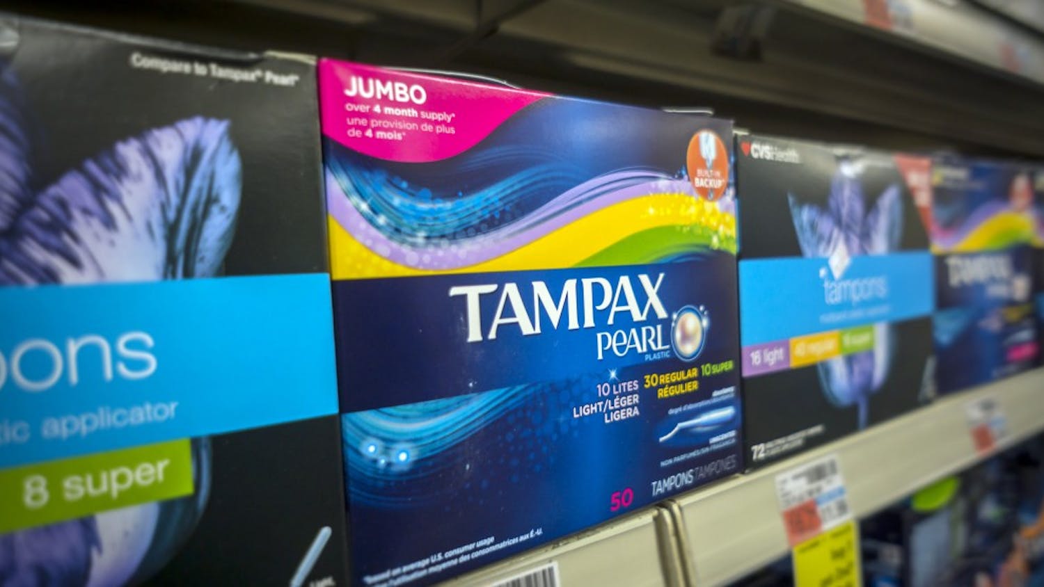 Boxes of tampons are displayed in a pharmacy in New York. A group of women has filed a lawsuit accusing the state of unlawfully taxing feminine hygiene products, arguing that medical items are exempt from sales tax. (Richard B. Levine/Newscom/Zuma Press/TNS) 