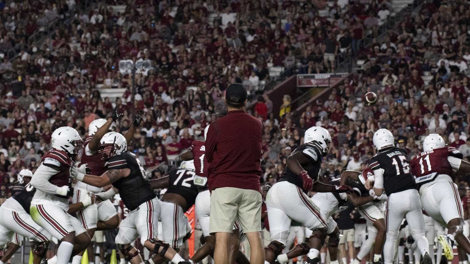 (FILE) Gamecock football head coach Shane Beamer watches as his team scrimmages at the Garnet & Black Spring Game on April 15, 2023. The 2023 season will be Beamer’s third season with the team. Beamer holds a 15-11 win-loss record. 