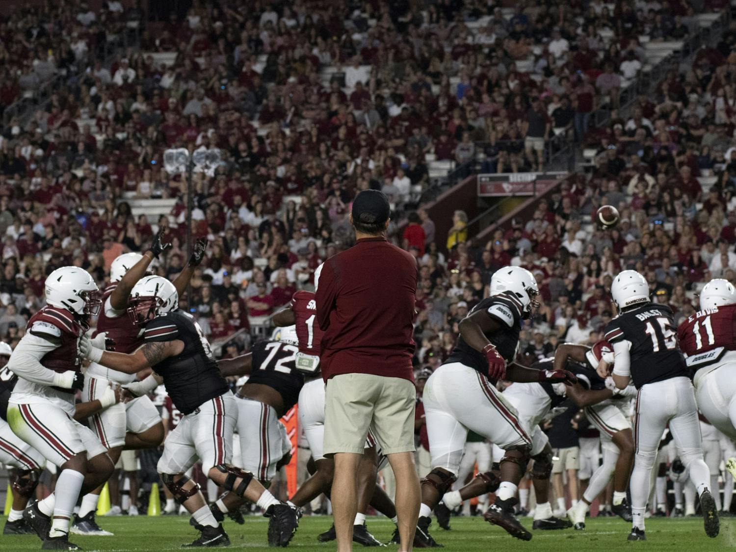 (FILE) Gamecock football head coach Shane Beamer watches as his team scrimmages at the Garnet & Black Spring Game on April 15, 2023. The 2023 season will be Beamer’s third season with the team. Beamer holds a 15-11 win-loss record. 