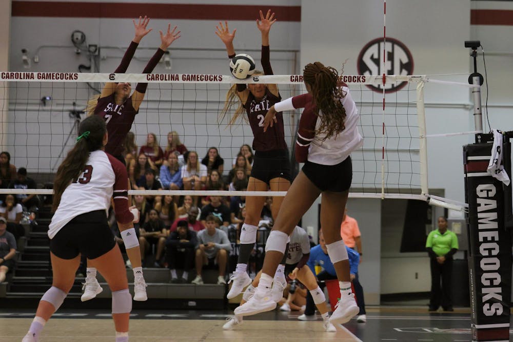 <p>A Mississippi State player blocks a spike from sophomore outside hitter Tireh Smith during a match at the Carolina Volleyball Center on Sept. 27, 2024. The Gamecocks lost to the Bulldogs 1-3 in their first SEC match of the season.</p>