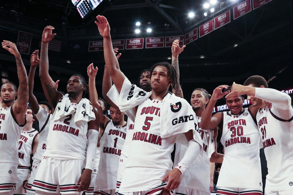 <p>The South Carolina men's basketball team celebrates by singing the university's alma mater after its 89-67 victory over George Washington on Dec. 1, 2023. The Gamecocks are currently 19-3 overall and 7-2 in SEC play.</p>