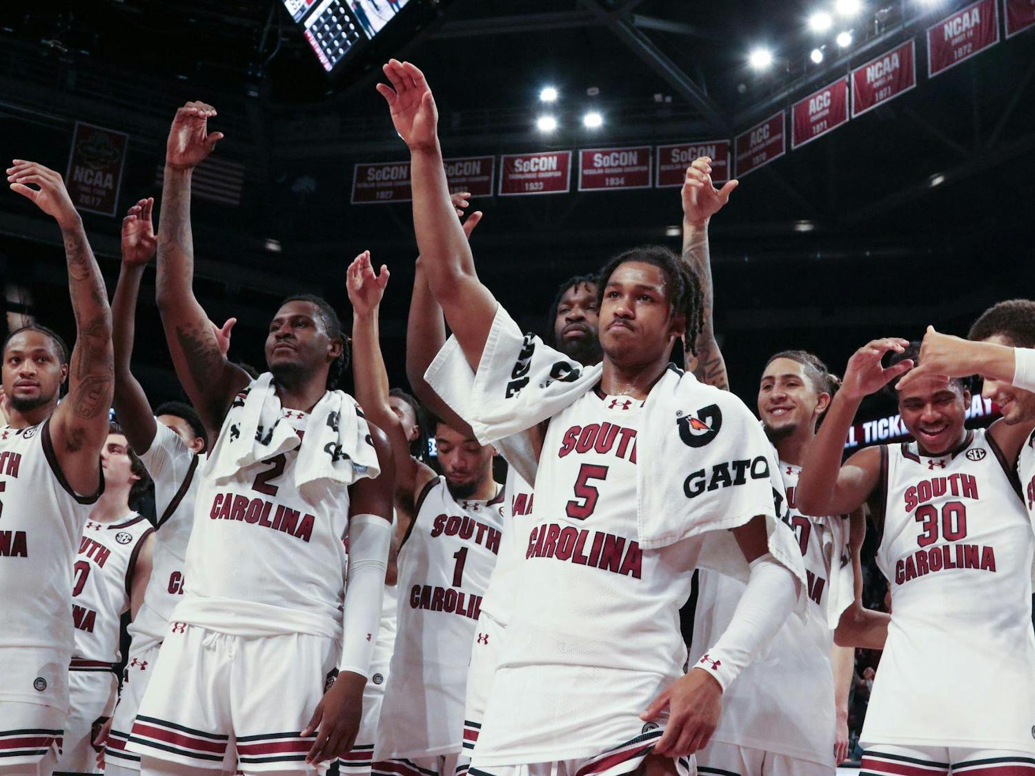 The South Carolina men's basketball team celebrates by singing the university's alma mater after its 89-67 victory over George Washington on Dec. 1, 2023. The Gamecocks are currently 19-3 overall and 7-2 in SEC play.