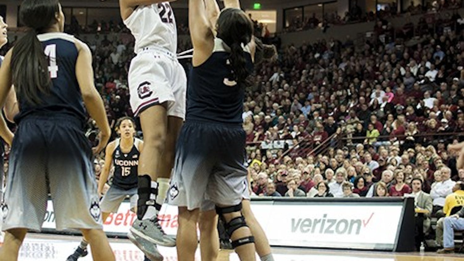 A'ja Wilson goes to make a shot against two UConn players. Wilson came in as a star freshman and has maintained her performance in the years of attending USC. 