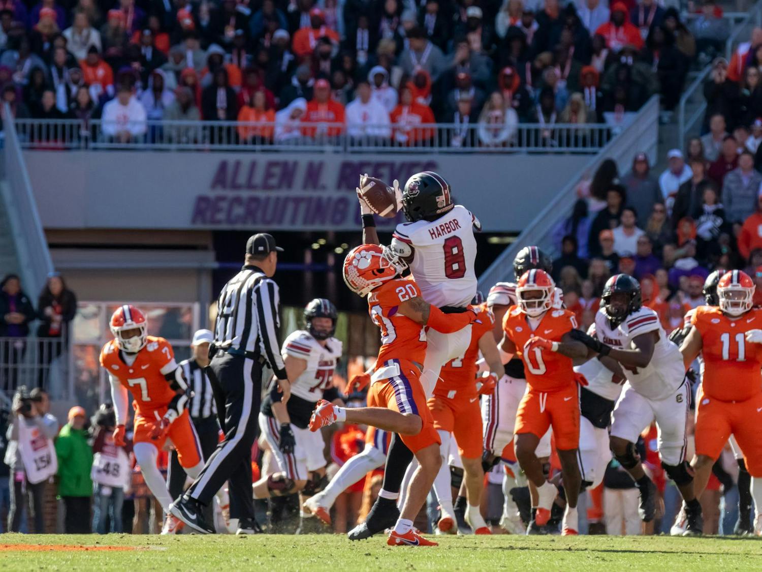 Sophomore wide receiver Nyck Harbor attempts to catch a pass mid-air against a Clemson defender on Nov. 30, 2024. Harbor had 3 receptions for 51 total yards.
