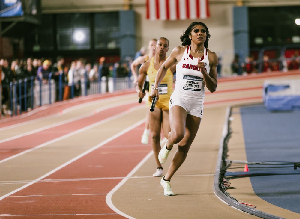 <p>Senior sprinter Makenzie Dunmore races along with USC Track &amp; Field while competing at the 2022 D1 Indoor Nationals at the CrossPlex in Birmingham, A.L., on March 12, 2022.</p>