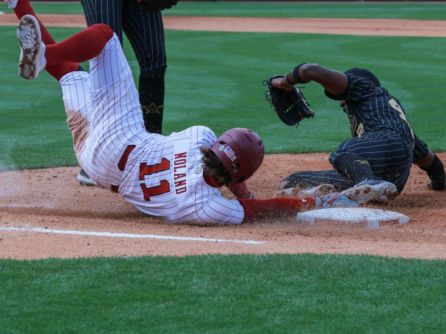 Fifth-year infielder Parker Noland dives toward first base during the Gamecocks' victory over Vanderbilt on March 23, 2024. Noland has a batting average of .264 for the 2024 season.
