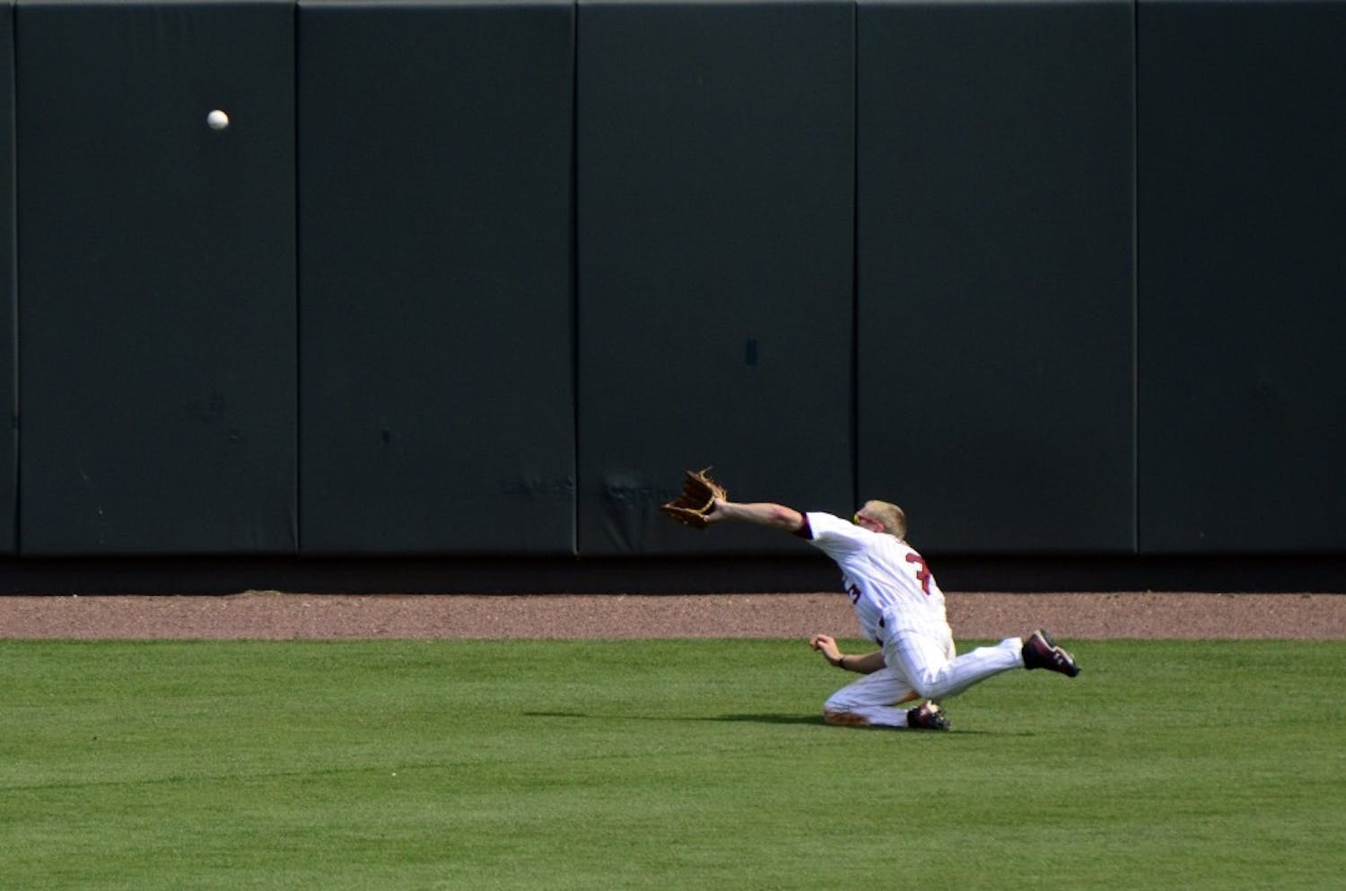 Tanner English makes a diving catch in the top of the ninth inning.