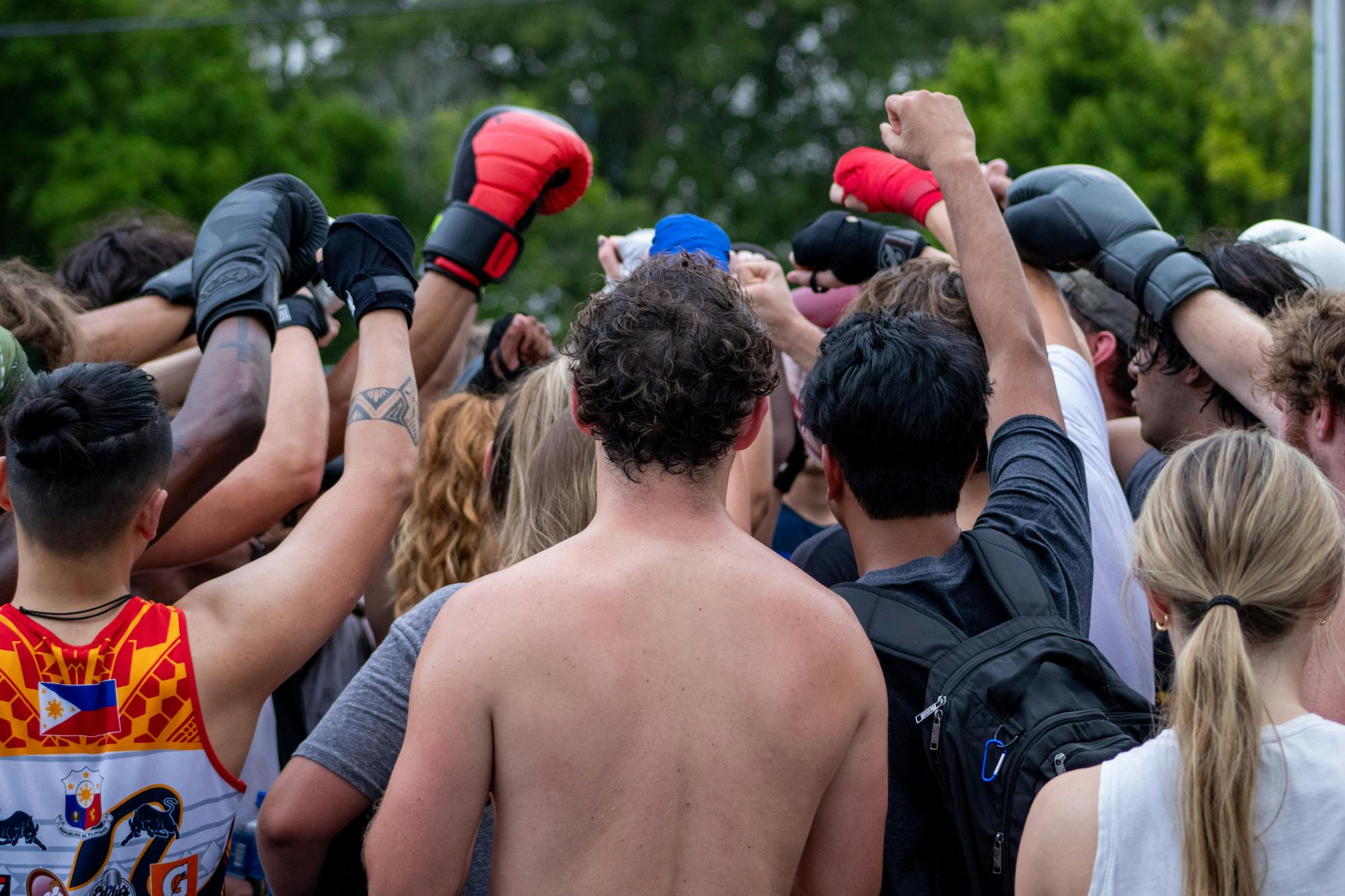Members of the Carolina Boxing Club raise their fists up in a final salute to conclude training. The Carolina Boxing Club gathered Sept. 12, 2022, at Battle Boxing Gym to prepare for the upcoming season.  