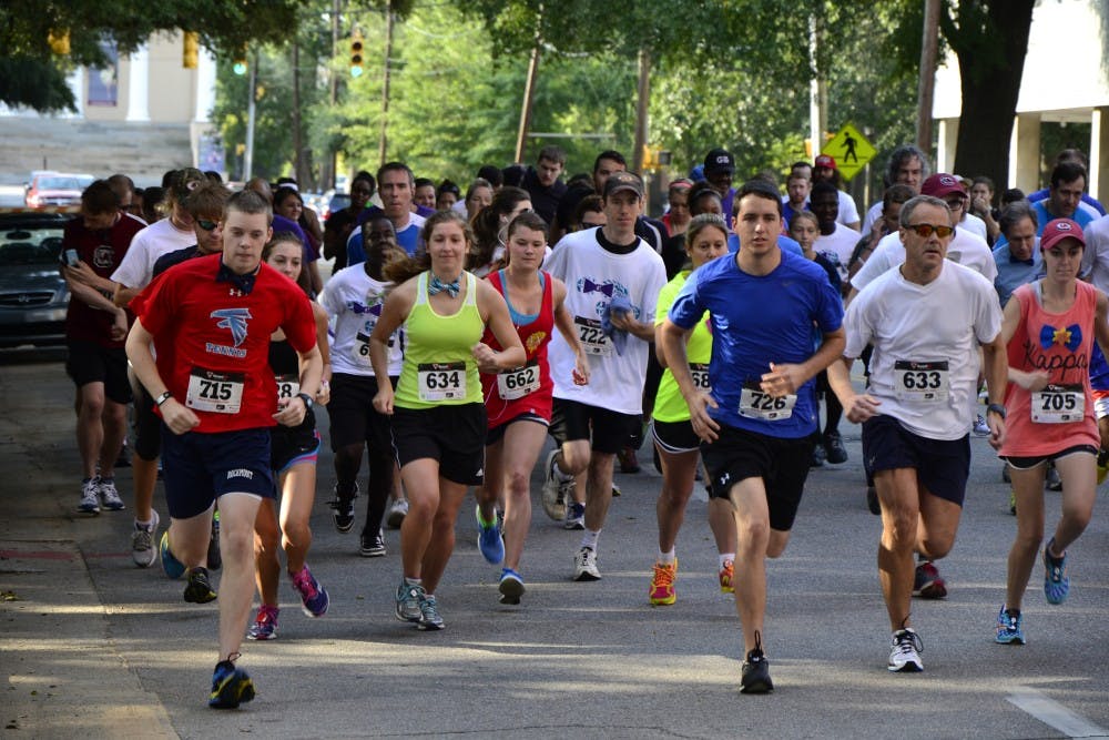 	Runners donned bow ties Saturday morning in order to honor past USC president Dr. Andrew Sorenson and benefit the Big Brothers Big Sisters of Greater Columbia organization.