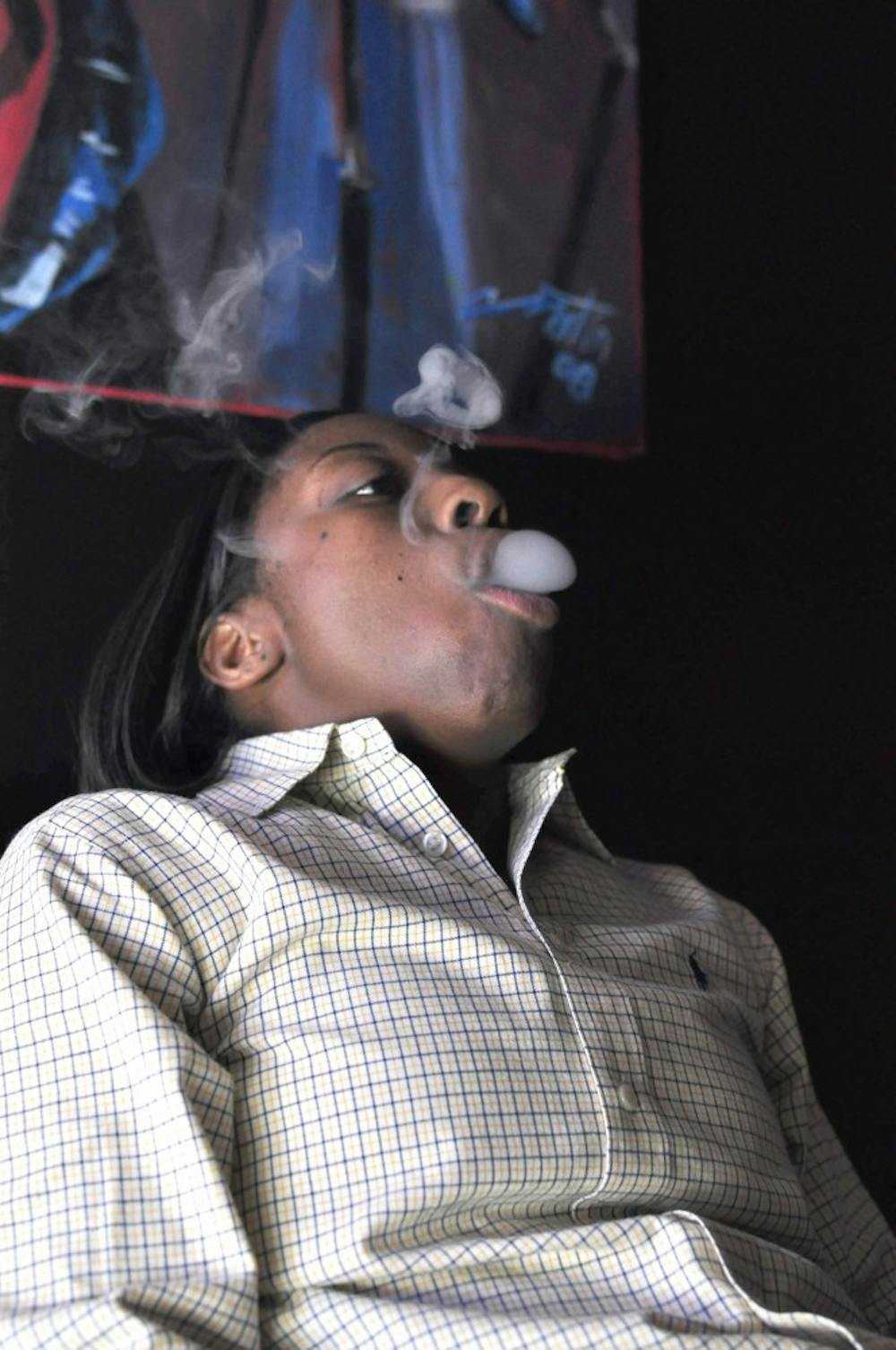 	<p>Ada Owens (above), a <span class="caps">USC</span> graduate, is one of two owners of the Hookah Spot, a new, suave tobacco lounge in Five Points.</p>