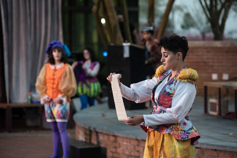 <p>Performers of the USC Theatre Department take part in a production of “The Complete Works of William Shakespeare (Abridged),” performed on the Russell House patio stage in March 2021.</p>
