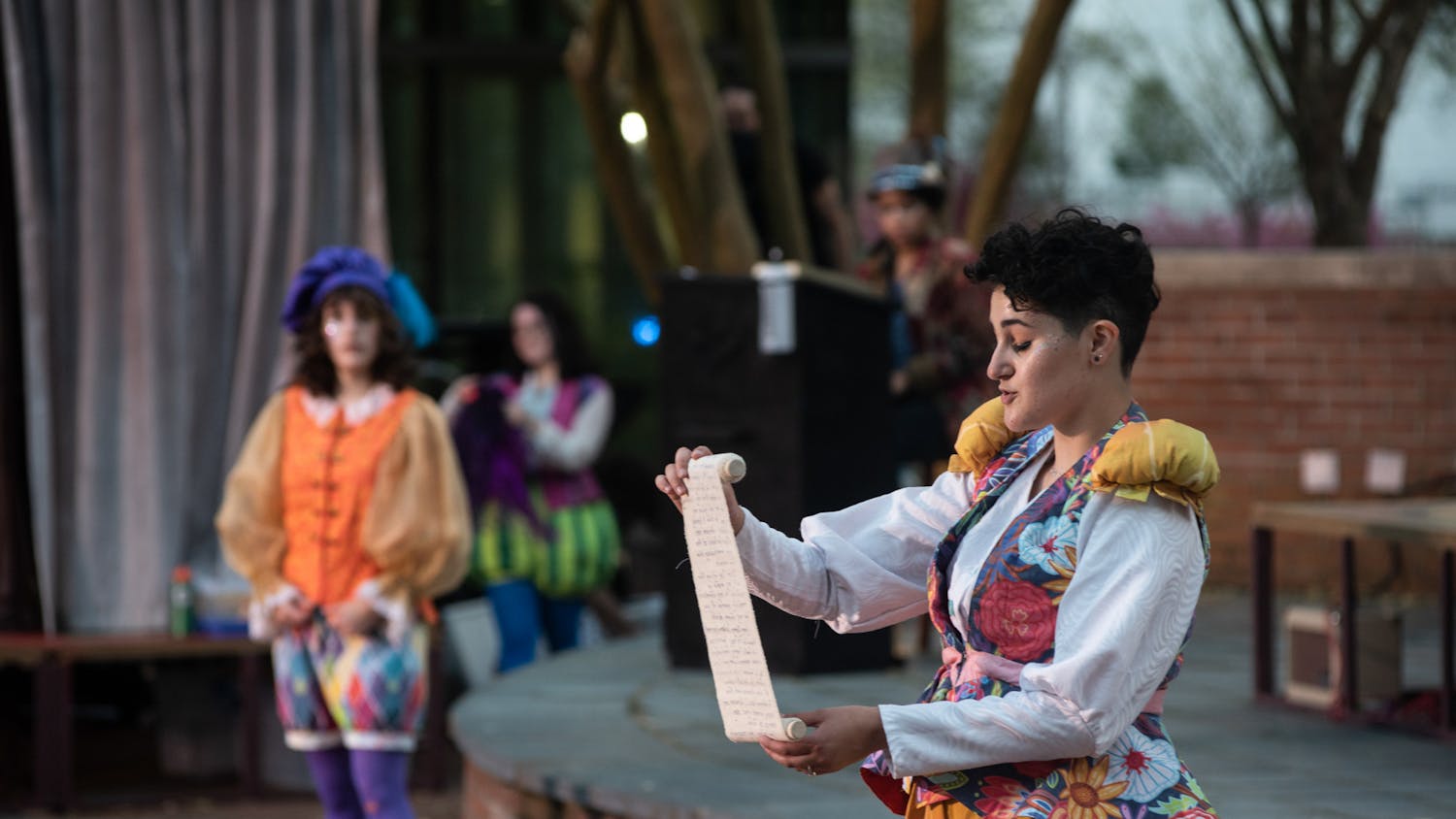 Performers of the USC Theatre Department take part in a production of “The Complete Works of William Shakespeare (Abridged),” performed on the Russell House patio stage in March 2021.