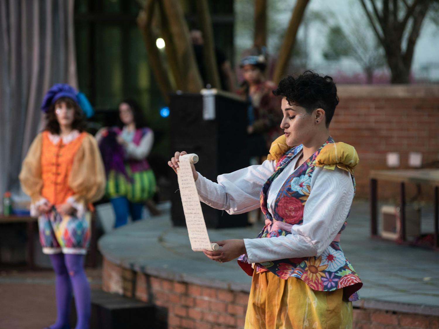 Performers of the USC Theatre Department take part in a production of “The Complete Works of William Shakespeare (Abridged),” performed on the Russell House patio stage in March 2021.